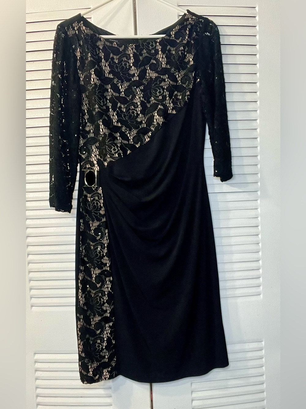 Tahari by Arthur S. Levine design 
black lace overlay cocktail dress
